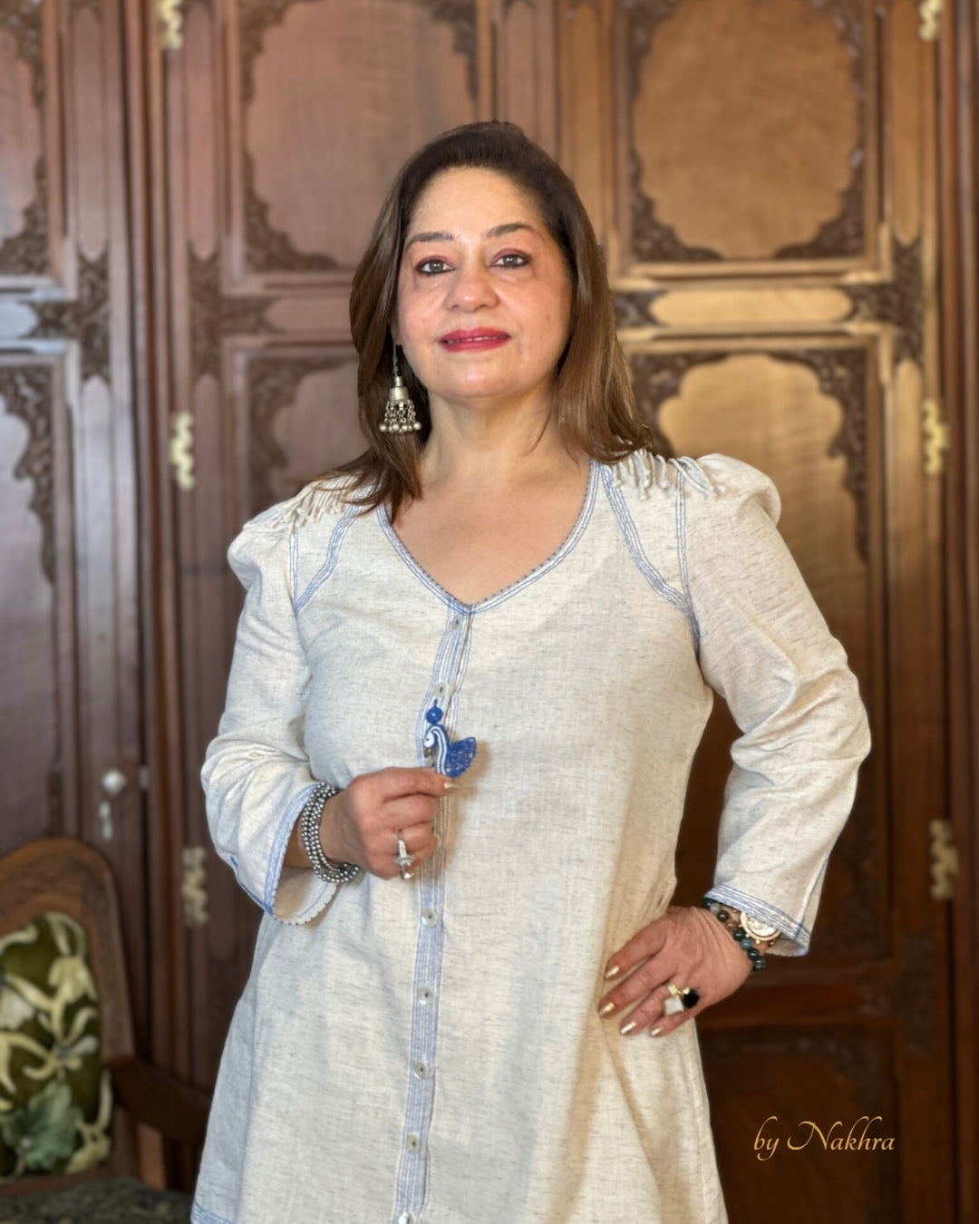 Puff sleeve with bold royal blue stitching on First Light co-ord in breathable ivory khadi cotton