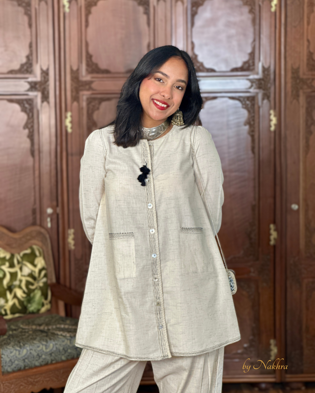 Close-up showing braid trims, bead accents, and handmade tassels on Morning Haze khadi co-ord set