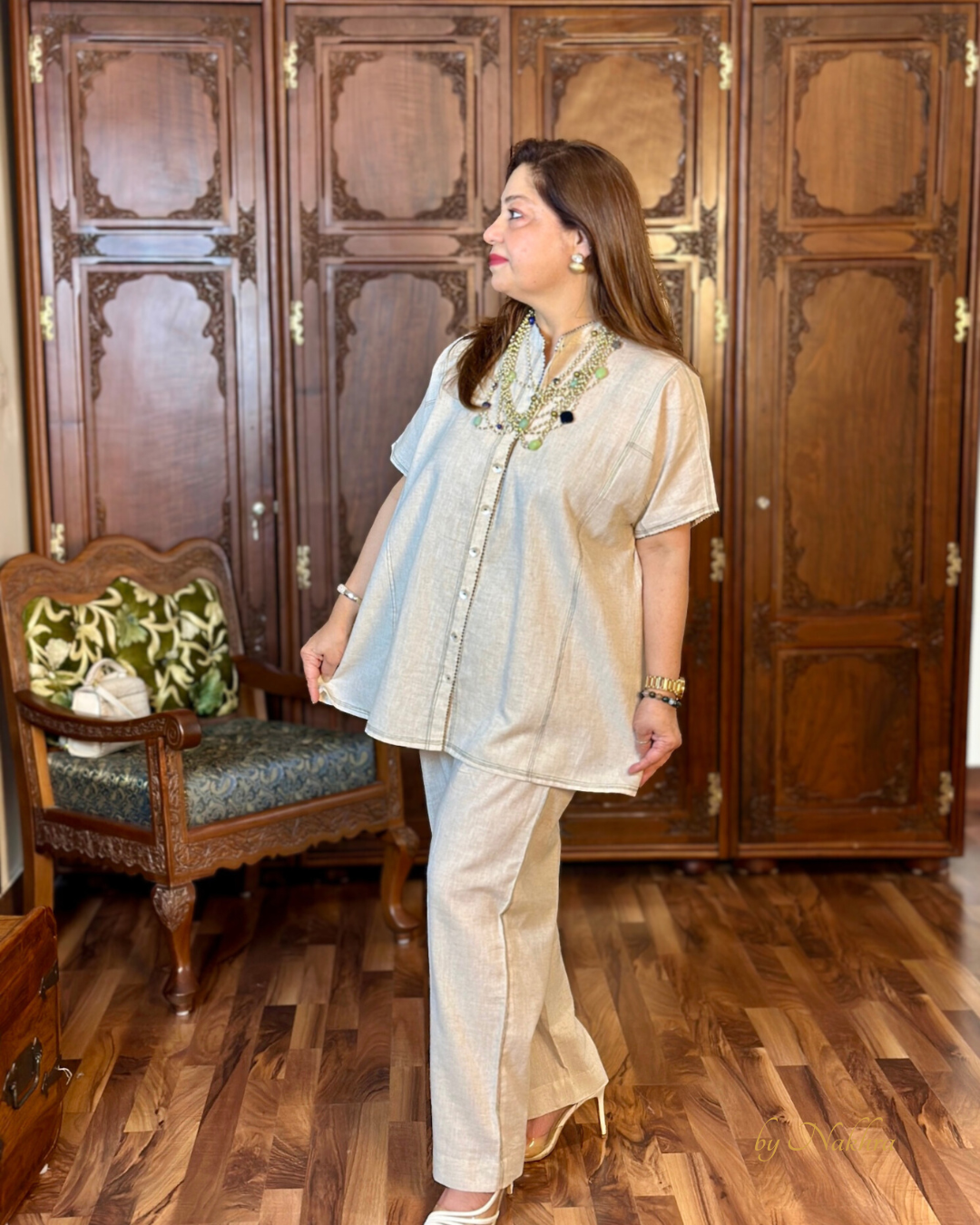 elder model styled in morning glory set in front view